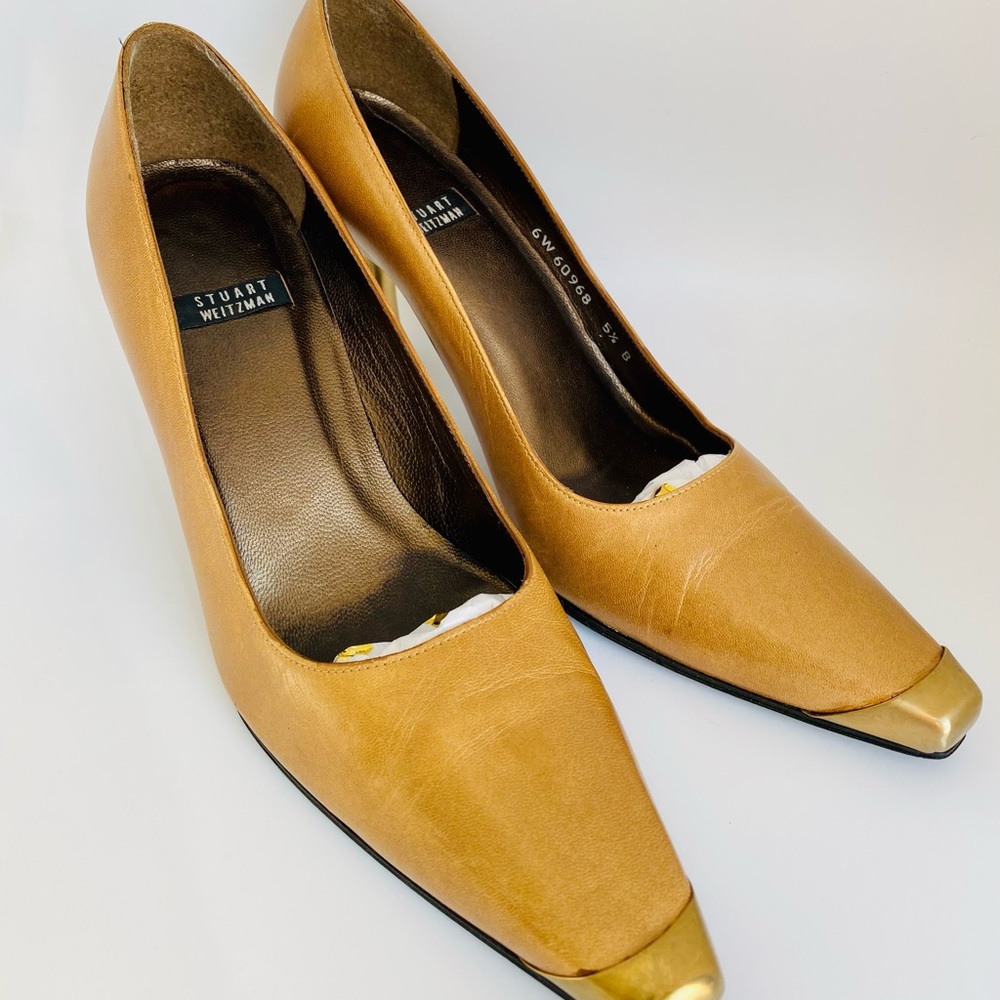 Steward Weitzman Dre’s shoes with metal on heel and toe